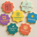 Colorful cookies with branded logos on a beige background